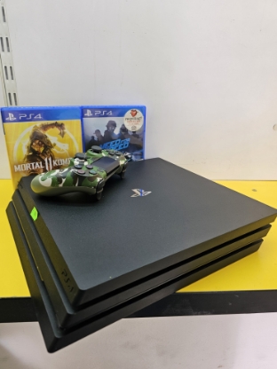 Imagine Consola PlayStation 4 PRO 1TB +1 Controller +2 Jocuri Cadou